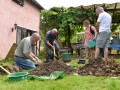 Removing soil from Test Pit 2.