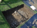 Evidence of cobbles and Medieval tile in Test Pit 2.